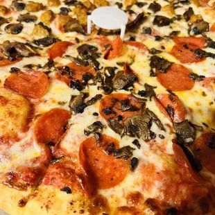 a pepperoni and mushroom pizza