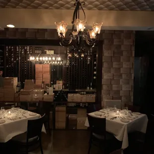 a dining room with a chandelier