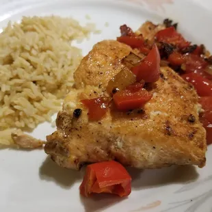 salmon steak with rice and seasonal veggies salmon was cooked perfectly! pink on the inside