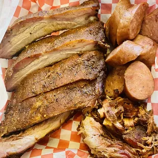 ribs, potatoes, and coleslaw