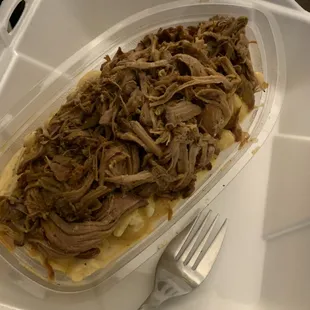 Mac n cheese boat with pulled pork.