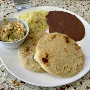 2 pupusa combo with rice &amp; beans. Delicious, recommend the pork &amp; cheese. $16.