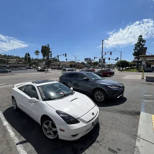 two cars parked in a parking lot