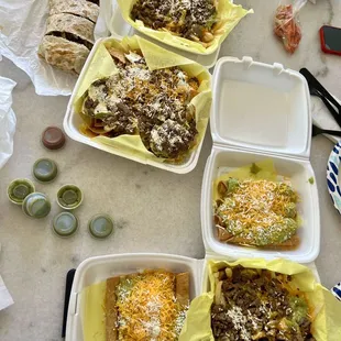 Beef roll tacos, Carne asada fries, carne asada nachos, and California burrito