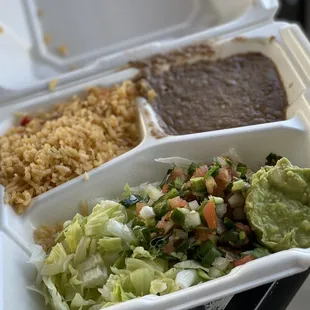 a meal in a styrofoam container