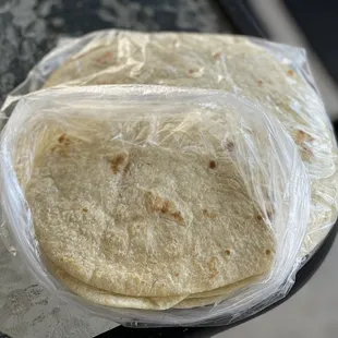 a tortilla wrapped in plastic
