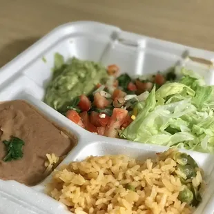 a meal in a styrofoam container