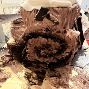 Crusty DRY ASS Yule log cake.  Do not buy!! The cake was flat + had the texture of plywood. Waste of $50.
