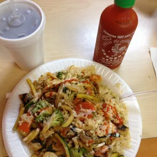 Hibachi Vegetable with white sauce and Sriracha.