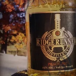 Sarnellis Liquor Store featuring RidgeRunner Distillery ...Vodka~Rum~Apple Pie Moonshine and Peach Moonshine