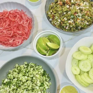 Condiments and Sides:
-Spicy Pickled Onions w/ Habanero
-Nopal Salad
-Onion &amp; Cilantro
-Fresh Cucumber