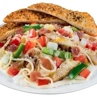 a plate of pasta with chicken and vegetables