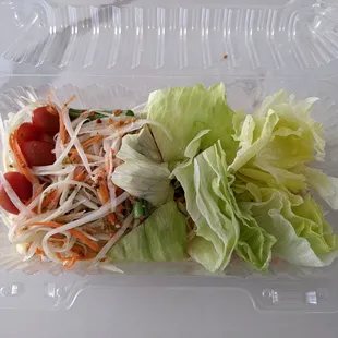 This papaya salad is mostly iceberg lettuce.
