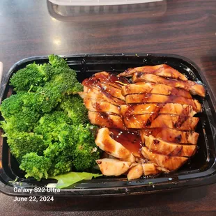 Thai style teriyaki chicken. Served with broccoli and carrots on a bed of cabbage.