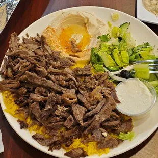 Beef shawarma, hummus and salad.