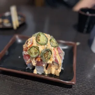 a plate of sushi on a table