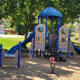 Small kids playground with few rocking animal rides