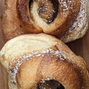two pastries on a cutting board