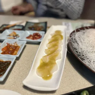 a variety of asian dishes on a table