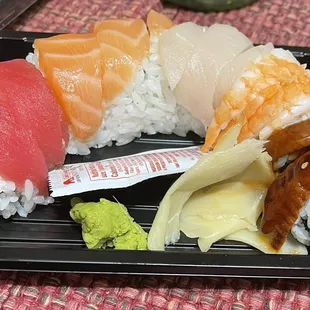 Rainbow roll cut in half. Supposed to equal two rainbow rolls.