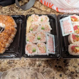 Albacore belly crunchy onion roll, real crab California roll, spicy tuna roll.. About fifteen dollars each roll