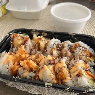 a tray of sushi on a table