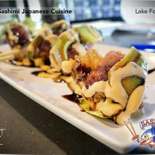 Dream Roll - Deep fried salmon, spicy tuna and avocado