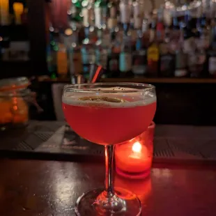 a cocktail in a coupe glass