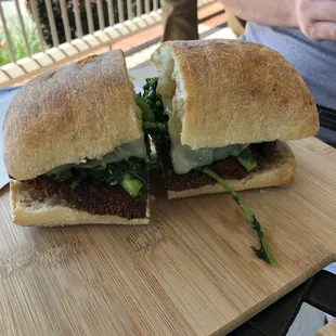 Chicken cutlet sandwich with broccoli rabe and provolone