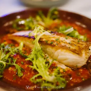 a dish of fish and vegetables