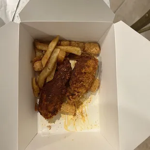 This is how it came. Was charged extra for 1/2 tots and fries, but it looks like someone ate them. There are SIX tots in the box.