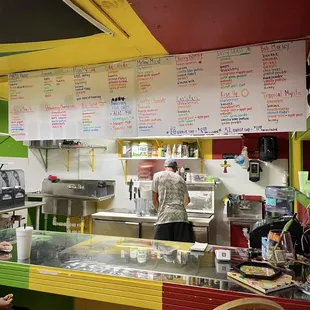 a man working behind the counter