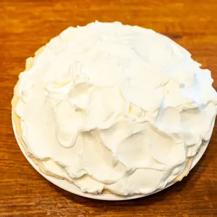 a cake with white frosting