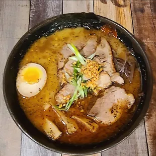 12-16-23 | CURRY RAMEN | Japanese curry mixed with tonkotsu broth. Chashu, half soft boiled egg, green onion, nori. Added bamboo and fungus.