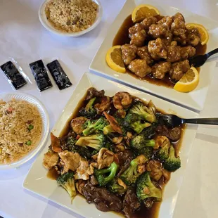 Triple Delight (beef, chicken, and shrimp with vegies) and orange chicken served with fried rice