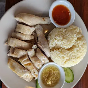 Hainan chicken rice. Not bad but i prefer you try something. Chicken not very flavorful itself
