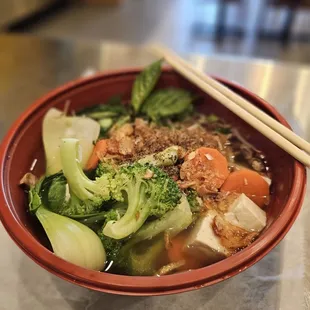 Veggies Phở with vegan broth, including broccoli, bok-choy, carrots, fresh mushrooms &amp; tofu.