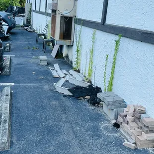 a parking lot with parked motorcycles