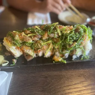 a close up of a plate of sushi