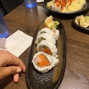 a plate of sushi on a table