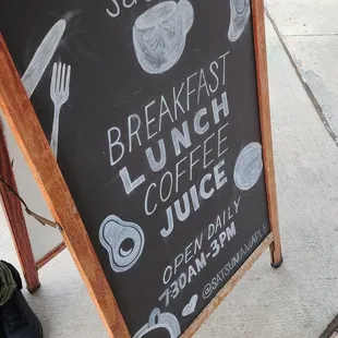 a sign for a breakfast lunch juice