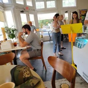 Inside of the place, guy in the green shirt looked like he was on a date making moves ;)