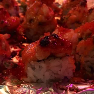 Baked Lobster roll. Looks like a face w/ two eyes lol.