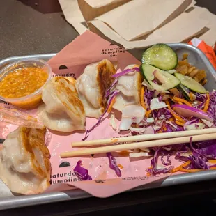 Hmong sausage dumplings with peanut sauce