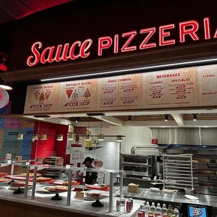 a large display of pizzas