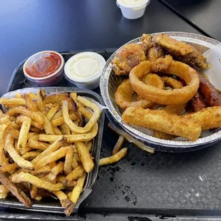 Salted Large French Fries with small big load of wings onion rings  honey hot bbq tenders and Mozzarella Sticks (3)