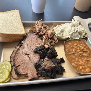 3 meat sampler (pulled pork, brisket and burnt ends) with beans and potato salad as the sides.