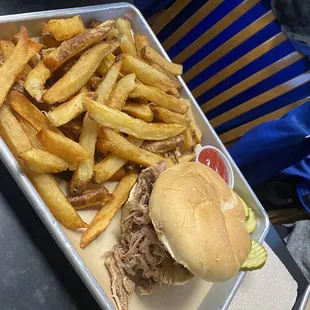 Pulled pork sandwich with fries