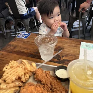 Chicken tenders (really good), waffle fries, and some kind of lemonade. Yum!