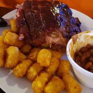 Ribs, baked beans, tots, pork loin